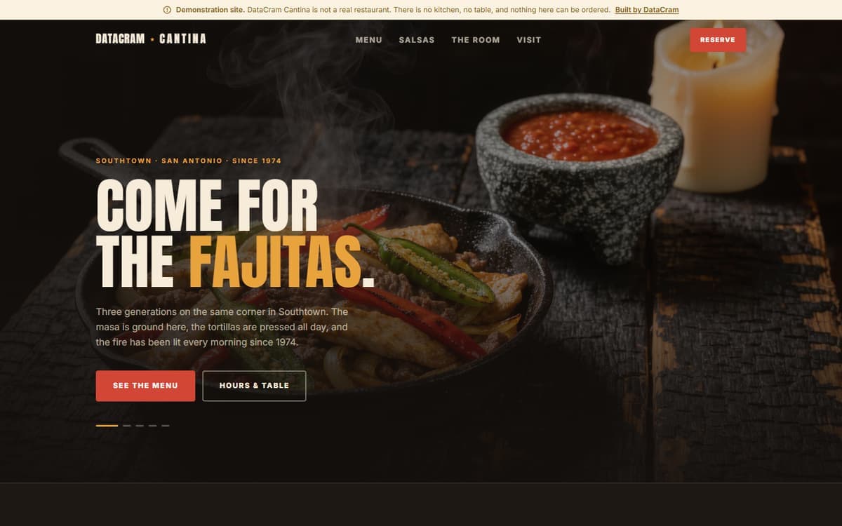The DataCram Cantina demo site: a disclosure bar, a cantina wordmark, and a headline reading 'Come for the fajitas' over a full-bleed photograph of fajitas on a cast-iron skillet.