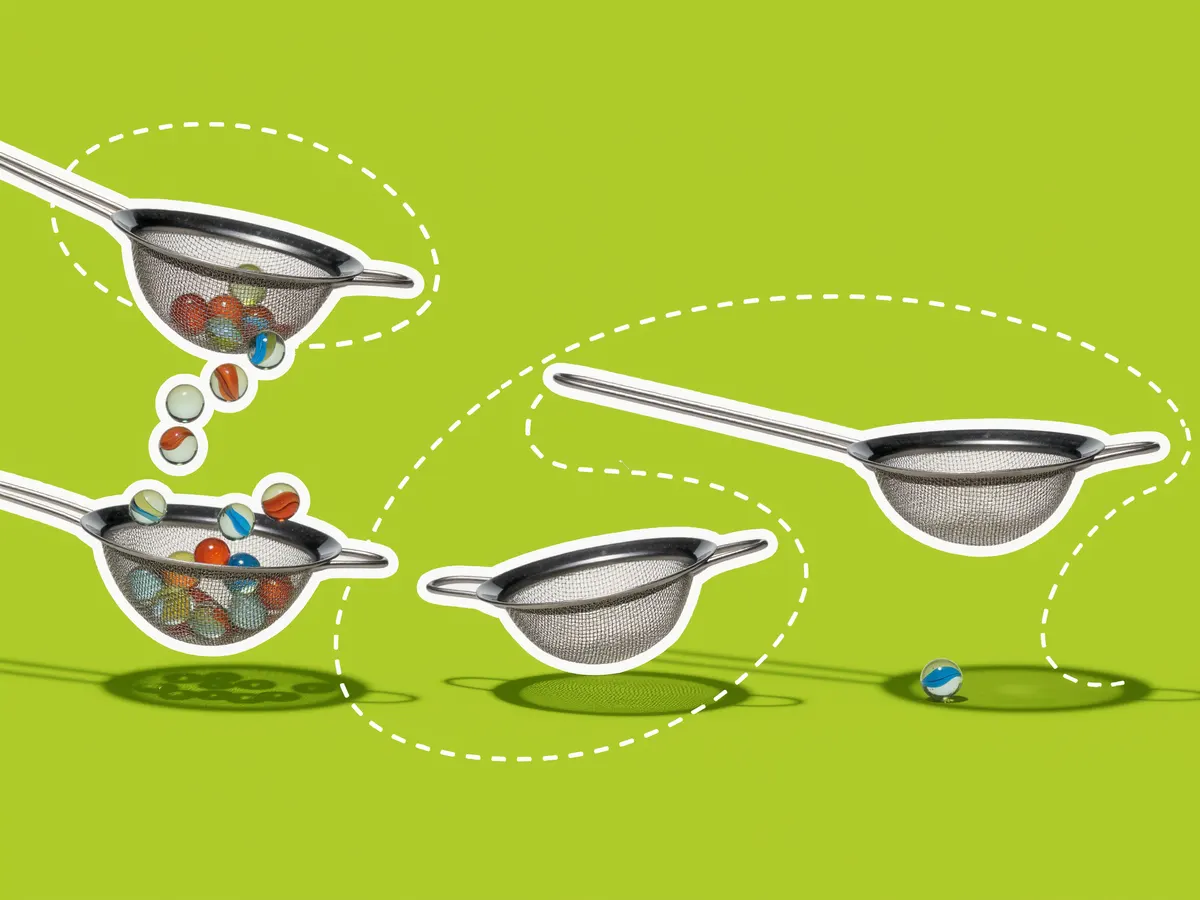 Four metal sieves with colorful marbles dropping from one to the next, on a bright lime green background.