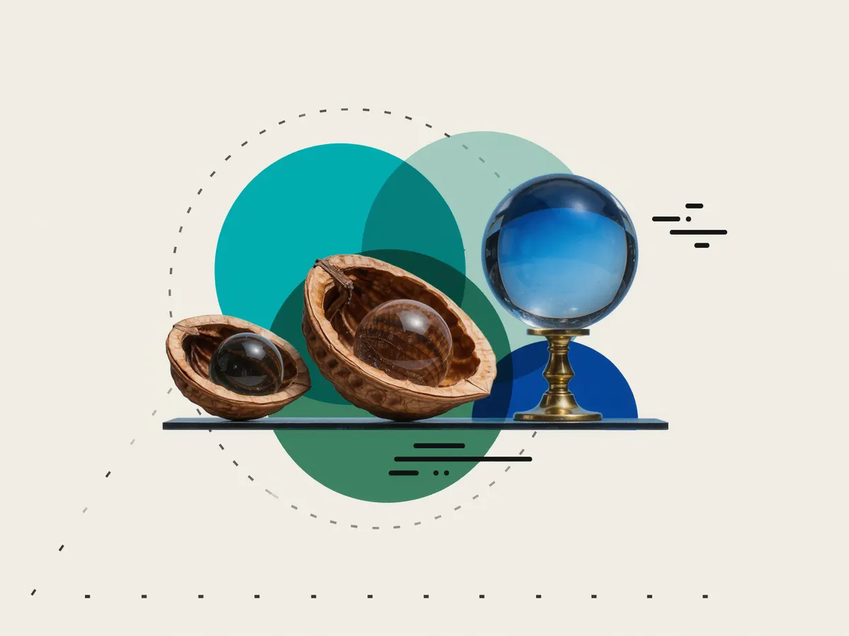 Two walnut shell halves holding glass marbles beside a crystal ball on a brass stand, over teal and green circles.