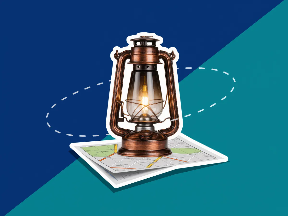A glowing brass lantern standing on a folded road map, with dotted lines arcing around it against a blue background.
